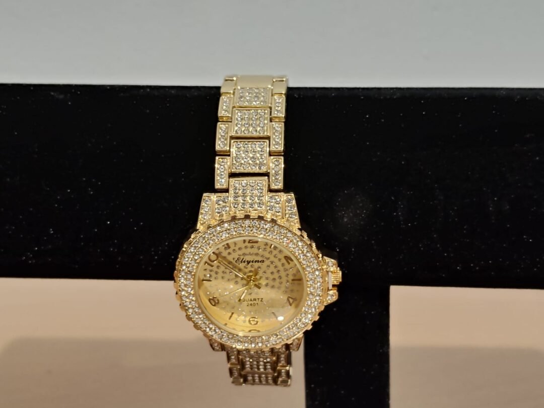 Ρολόι χειρός με μπρασελέ και ζιργκόν σε χρυσό και ασημί-χρυσό