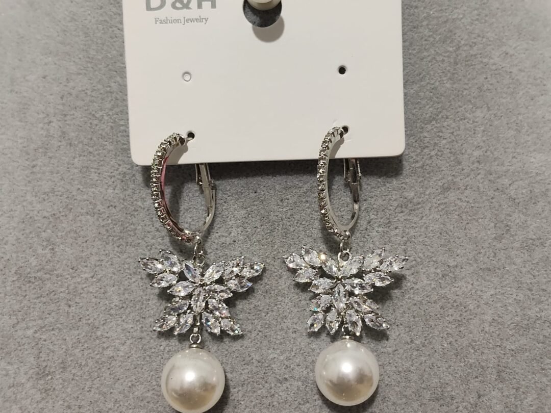 Σκουλαρίκια αστέρι με μεγάλη πέρλα και ζιργκονάκια